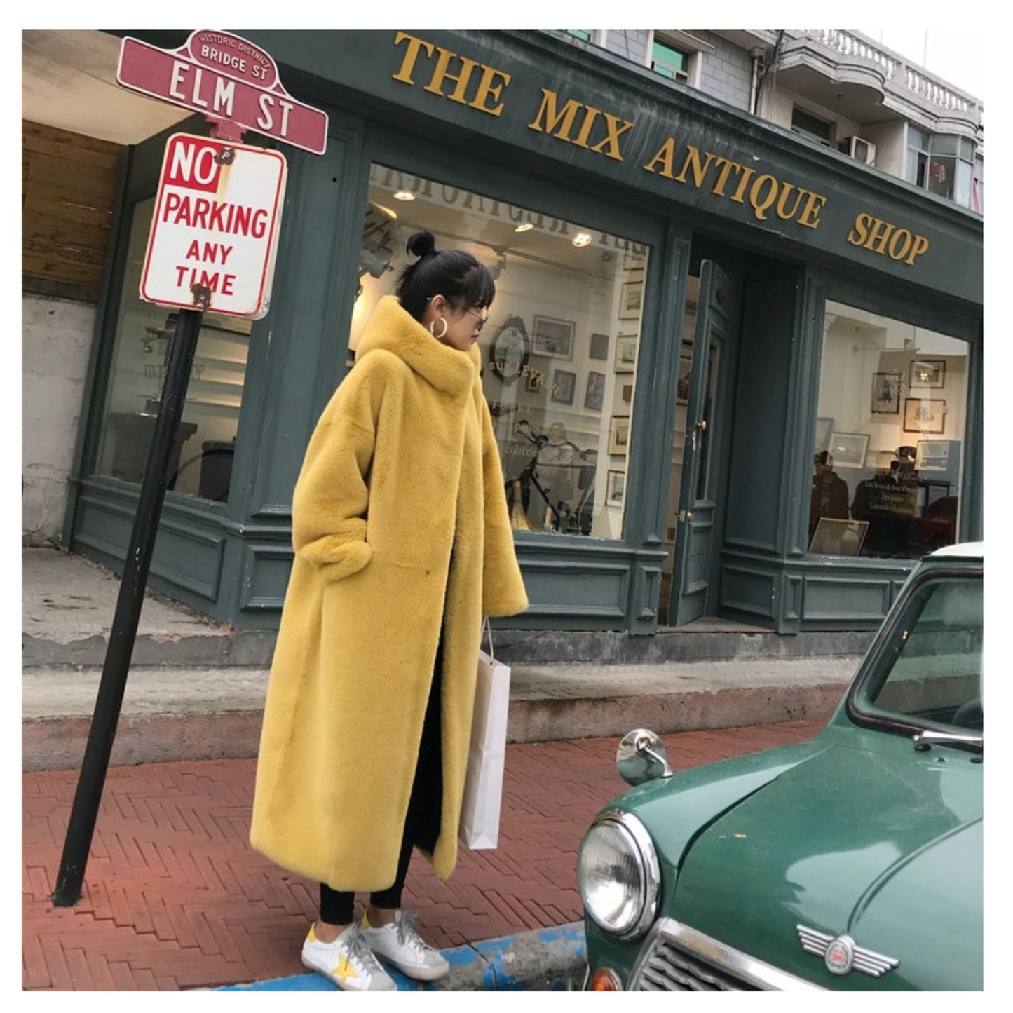 New Korean version of mink fur thick loose plush hooded long coat.